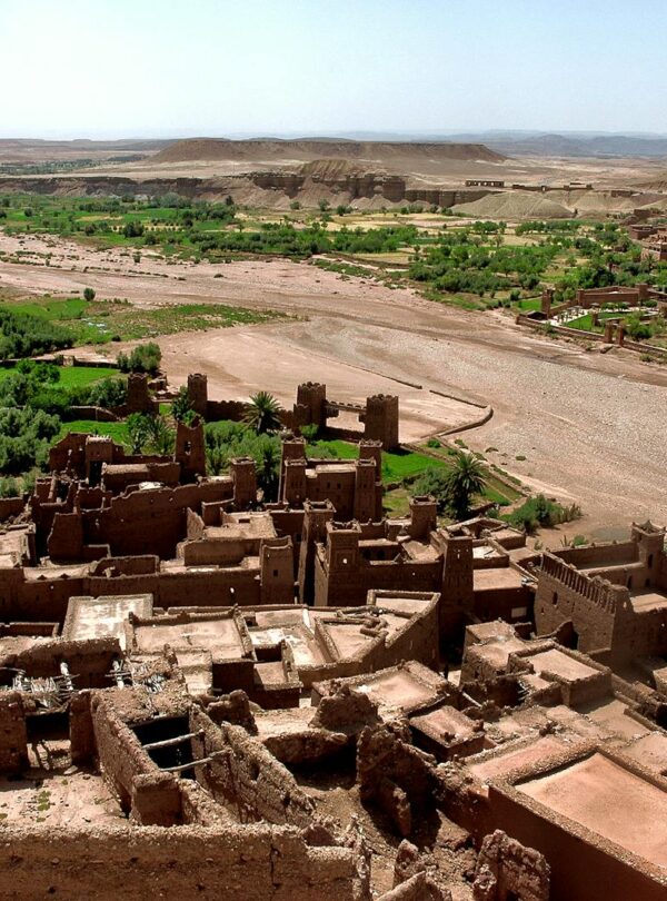 Stunning aerial view of Ouarzazate's ancient kasbahs amidst lush greenery.Morocco itinerary 7 days ,morocco travel